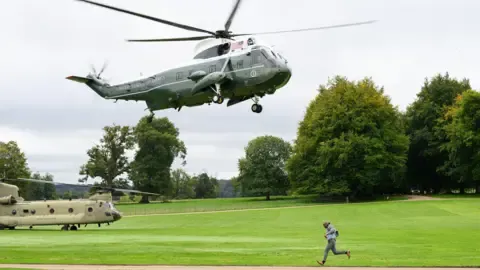 The US President Rerouted and Compelled to Swap Helicopters En Route to Stansted